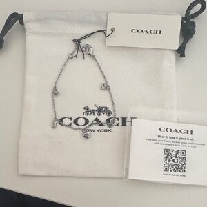 NWT Coach Silver Charm Bracelet with Iconic Charms